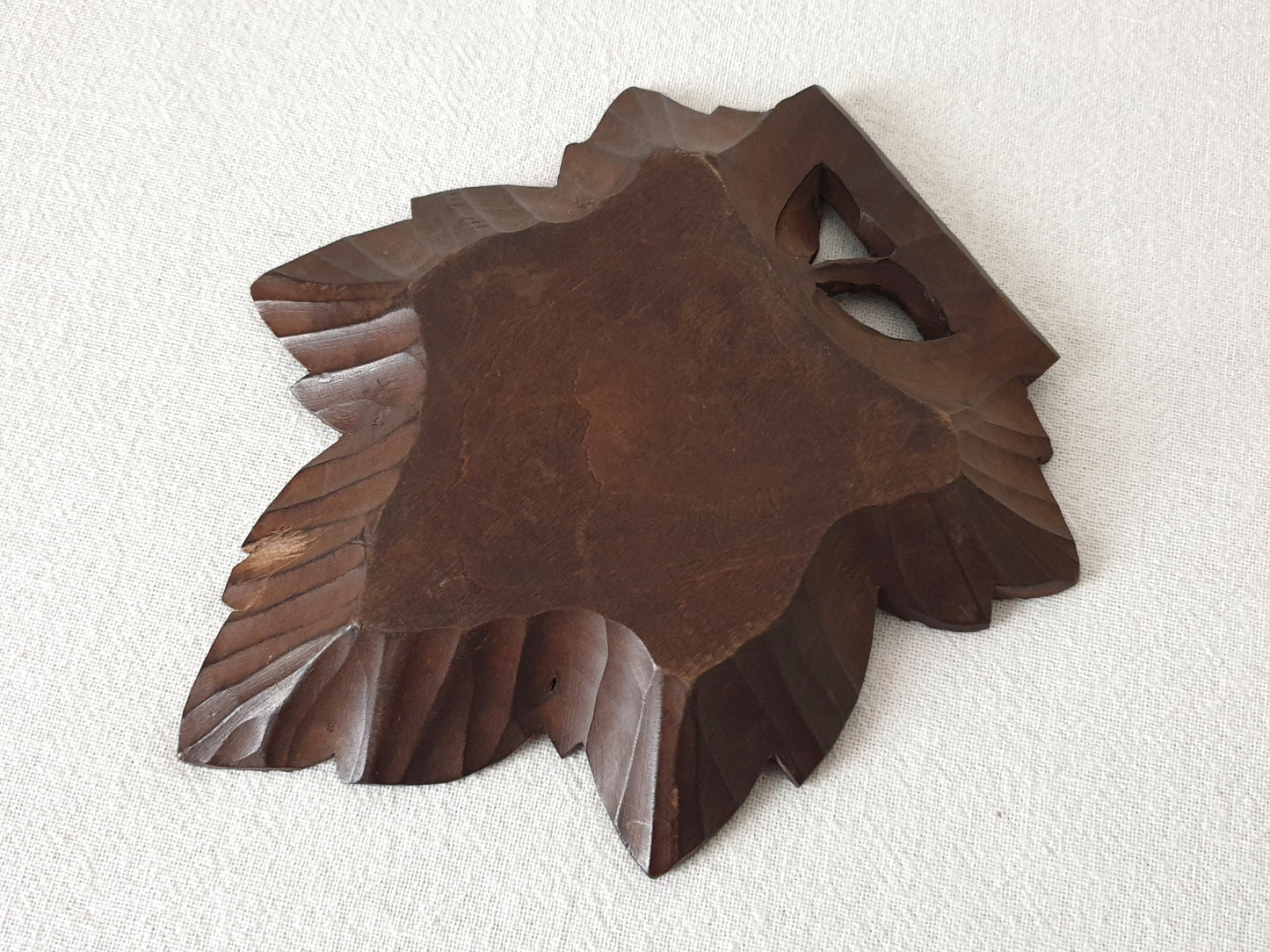 Vintage Hand-Carved Black Forest Wooden Plate with Grapevine Leaf Design