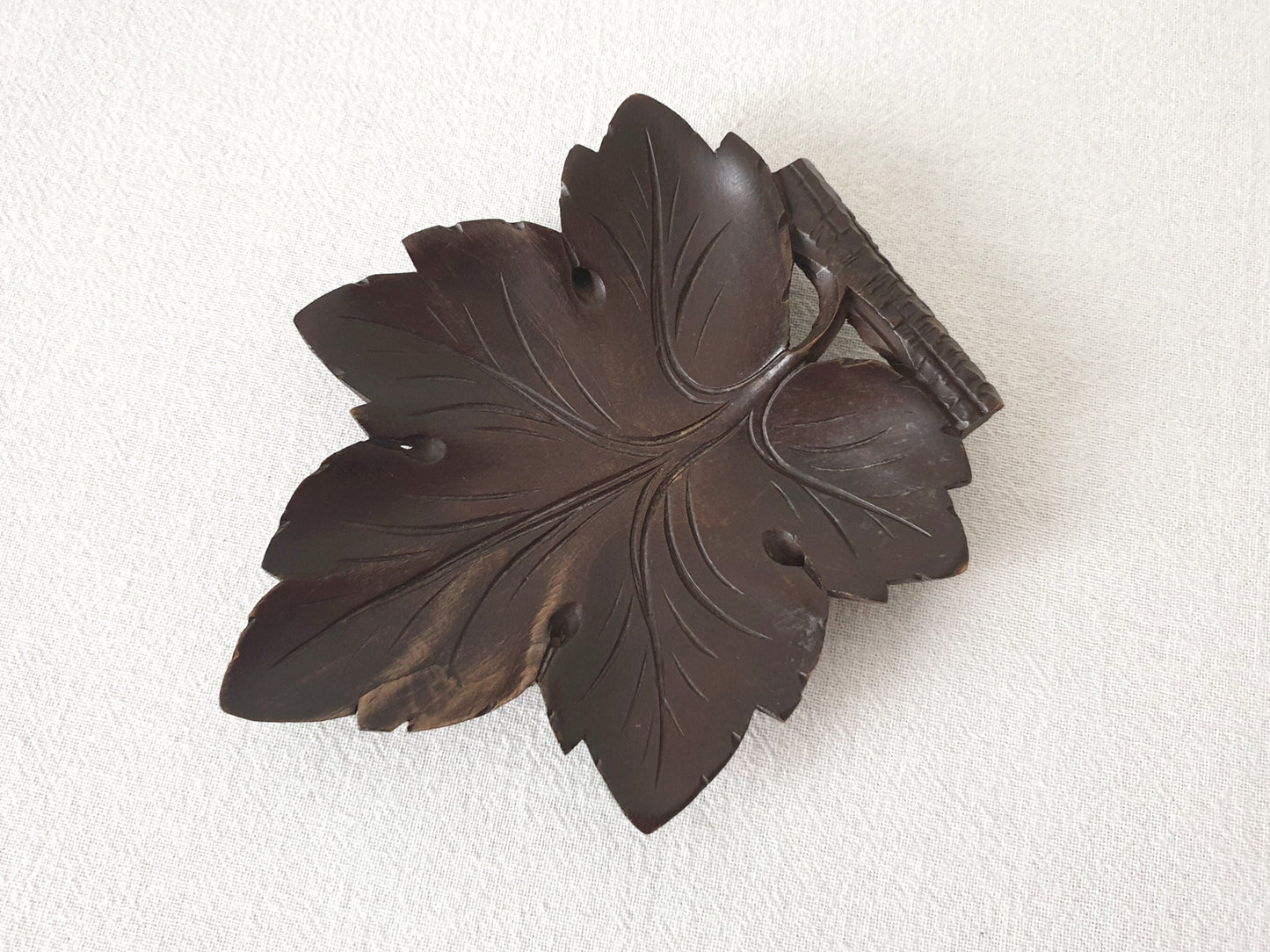 Vintage Hand-Carved Black Forest Wooden Plate with Grapevine Leaf Design