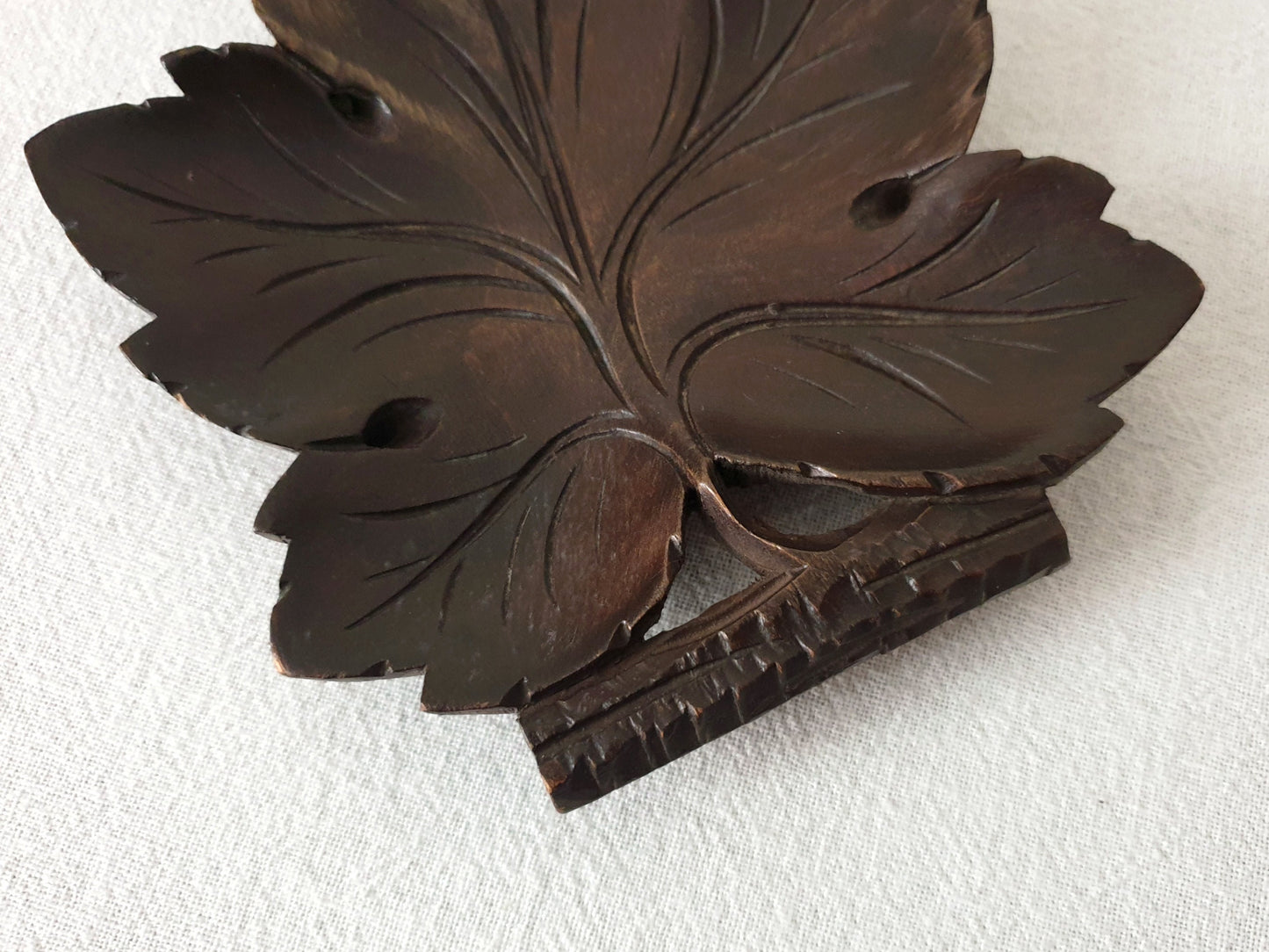 Vintage Hand-Carved Black Forest Wooden Plate with Grapevine Leaf Design