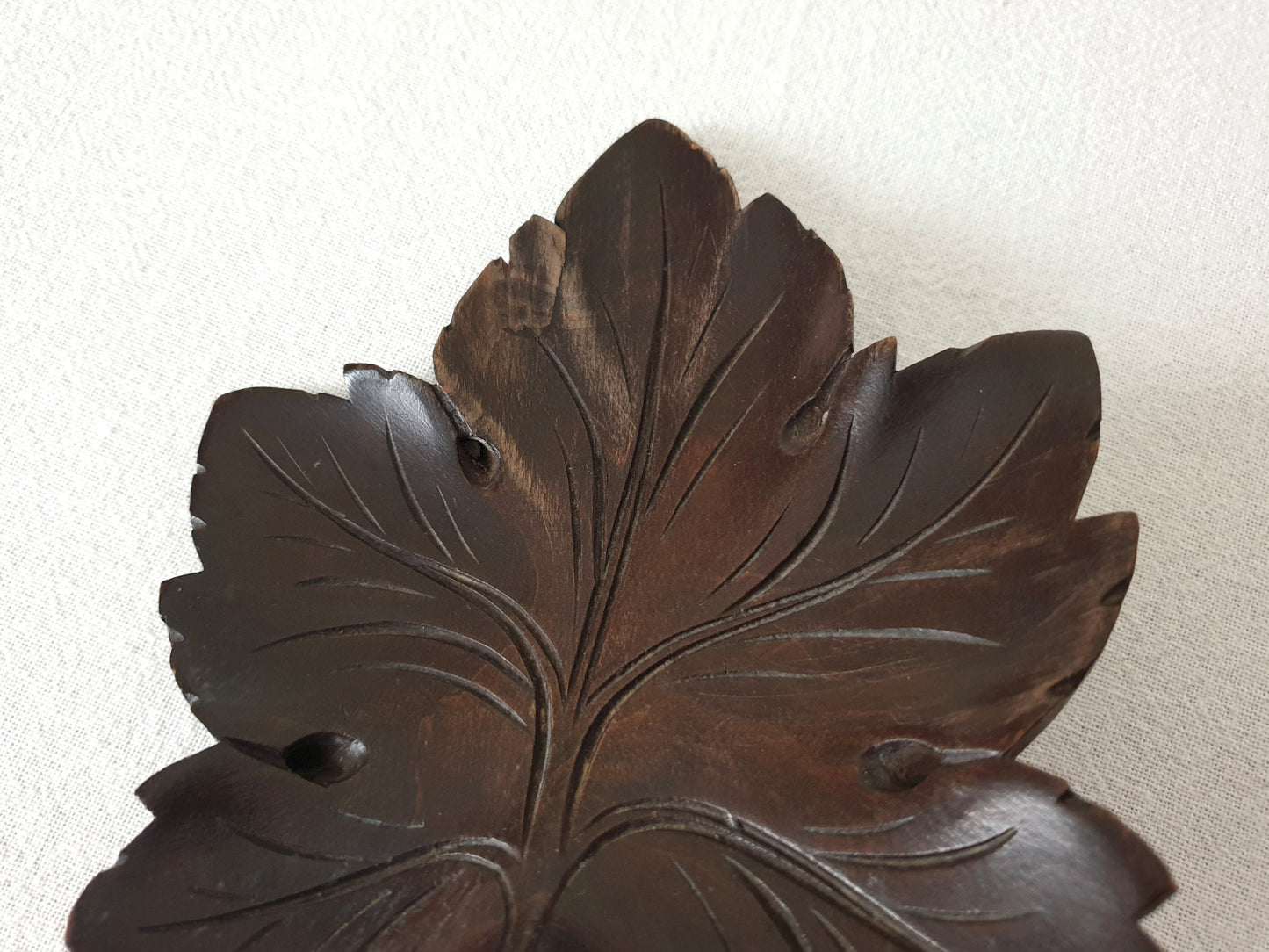 Vintage Hand-Carved Black Forest Wooden Plate with Grapevine Leaf Design