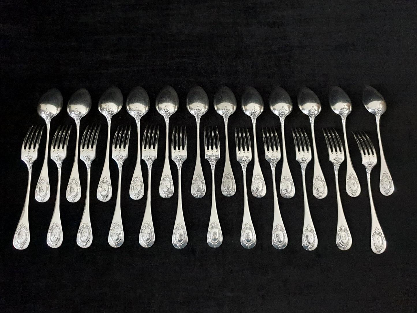 12 Pairs of Christofle Silver Plated Dessert Spoons and Forks - Louis XVI Style 24-Piece Dessert Cutlery Set Circa 1900s