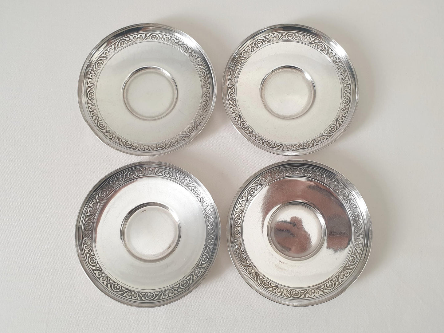 Set of 4 Silver Plated Cups and Saucers with Acanthus Leaf Designed Handles by Denis Gérard, Paris