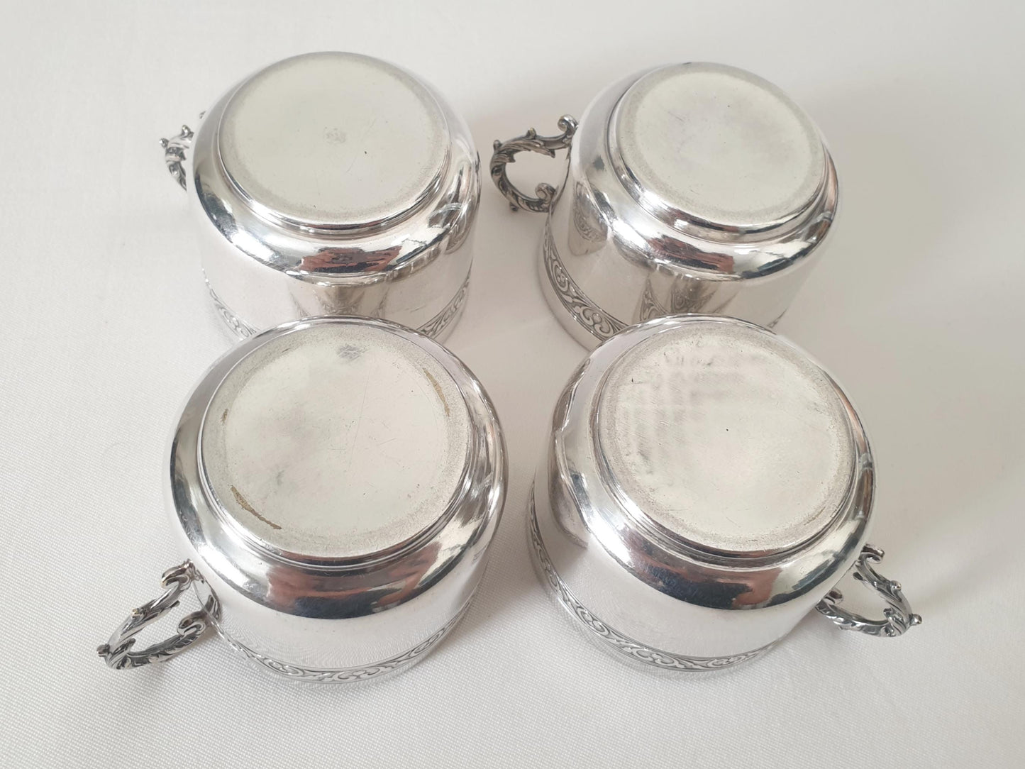 Set of 4 Silver Plated Cups and Saucers with Acanthus Leaf Designed Handles by Denis Gérard, Paris