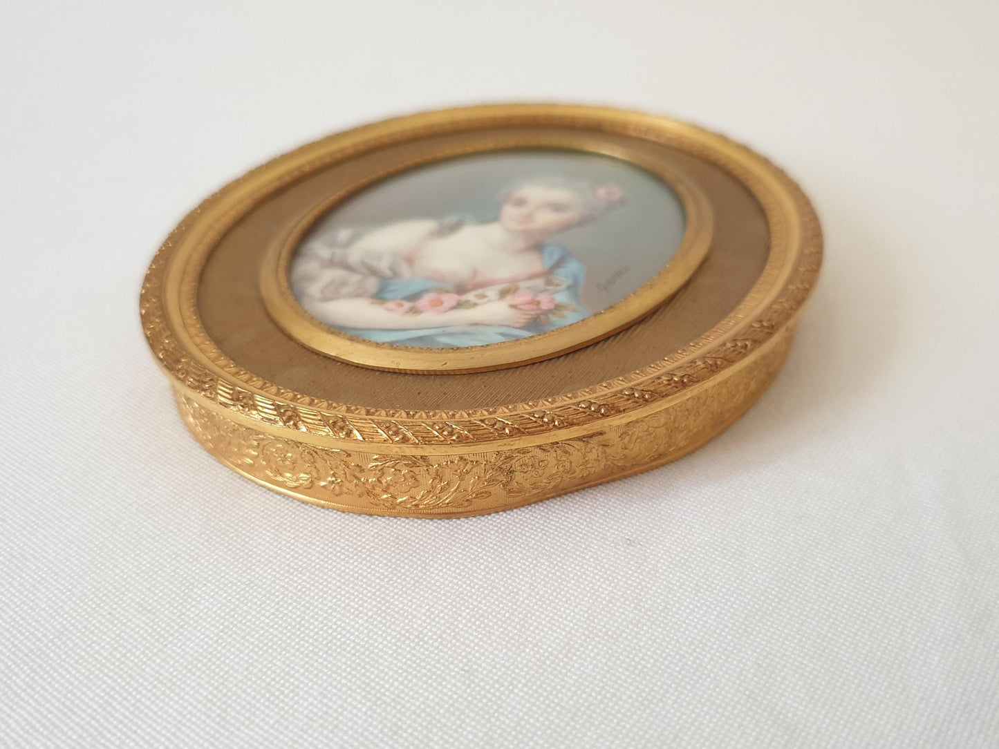 Antique 19th Century Hand Painted French School Miniature Portrait of a Lady with Flowers, Signed GAMET, in Gilded Bronze Medallion Frame